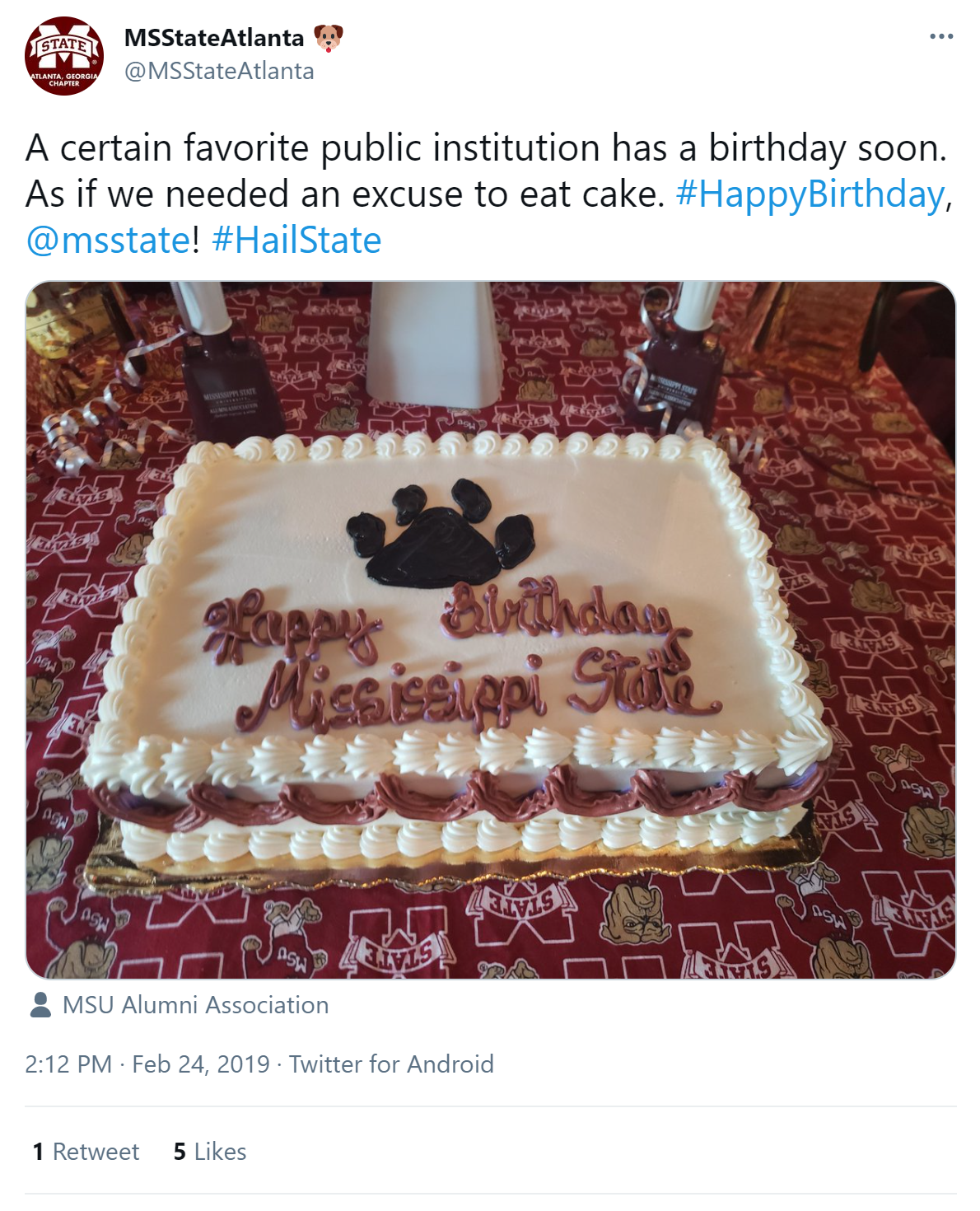 Birthday cake with white icing and maroon writing that says Happy Birthday Mississippi State